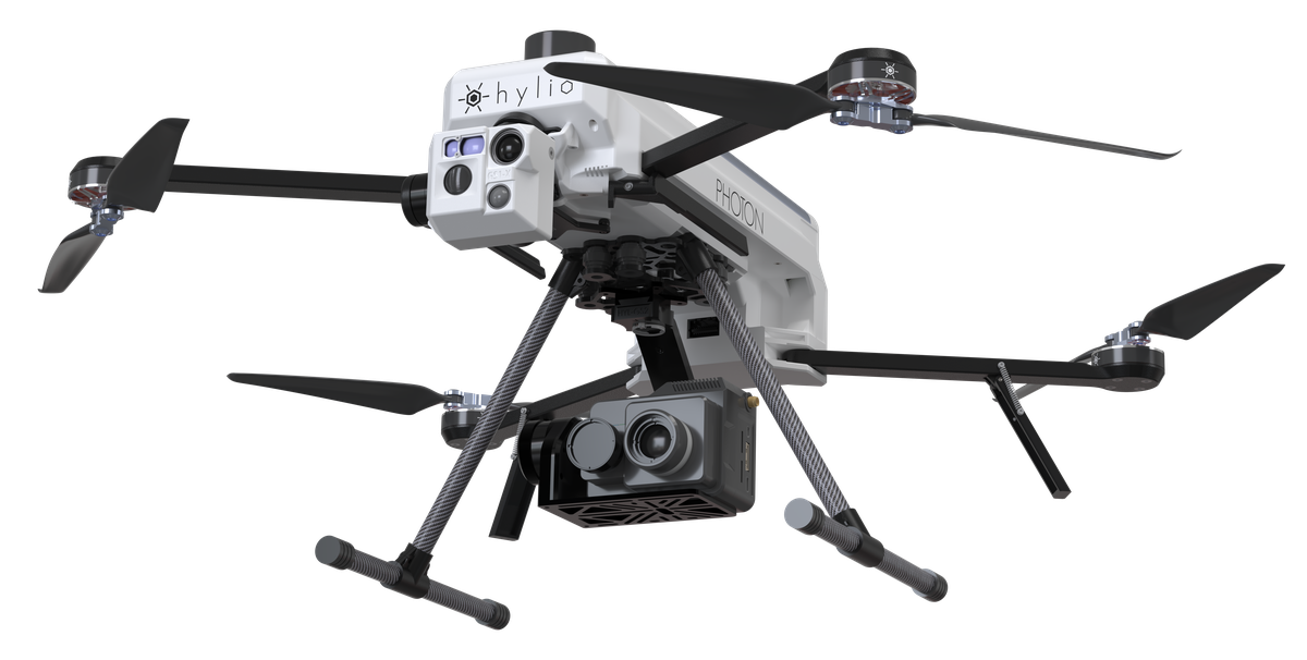 Hylio PHOTON scout drone, three-quarter view, with the camera head on top and the mapping sensor under the body